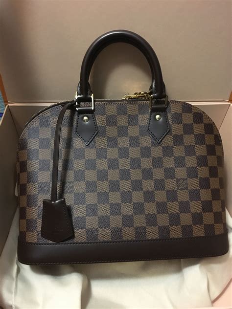 louis vuitton alma damier pm|louis vuitton alma pm price.